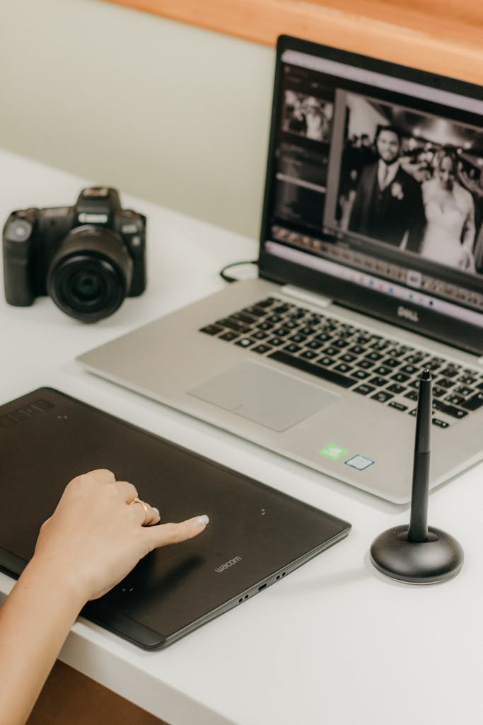 Woman Editing Photos on Laptop